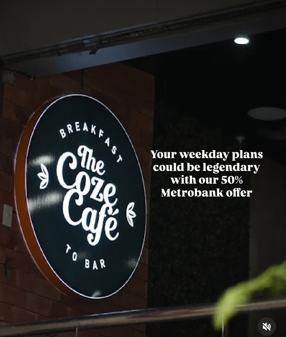The Coze Café illuminated signage at night